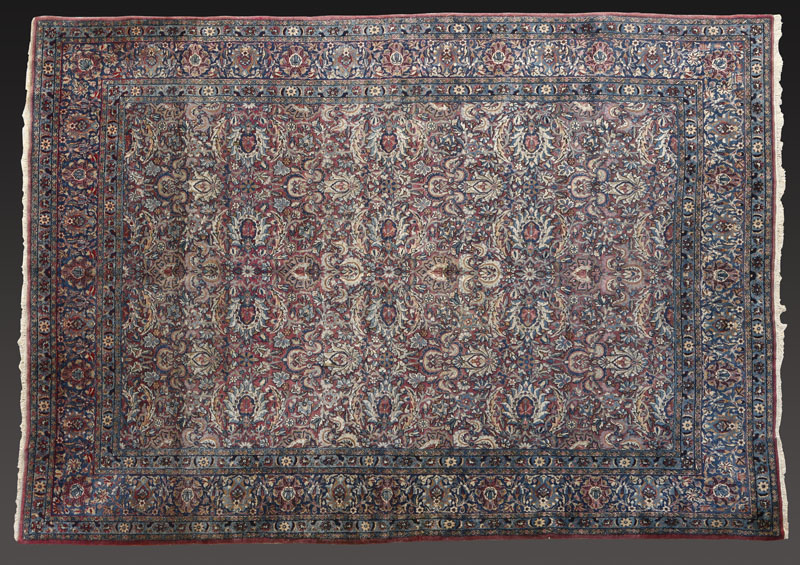 Appraisal: A Persian Mashad woolen carpet rug A Persian Mashad woolen