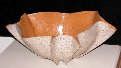 Appraisal: Punch Bowl Untilted Shell Form Bowl Ceramic on Ceramic Ceramic