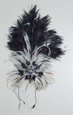 Appraisal: Feather Mask Snowflake Obsidian Composed of feathers from peacocks silver