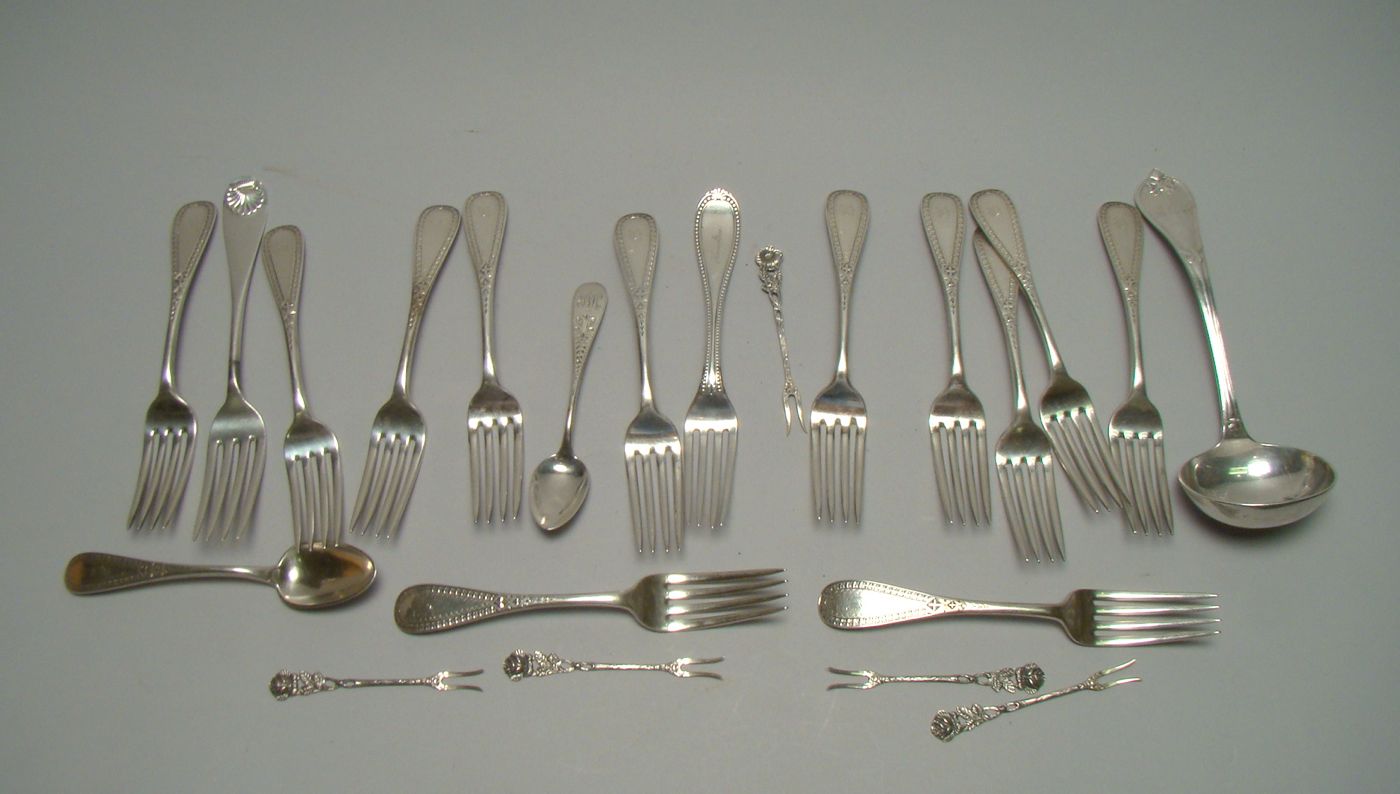 Appraisal: TWENTY-TWO PIECES OF STERLING SILVER FLATWARE By various makers Consists