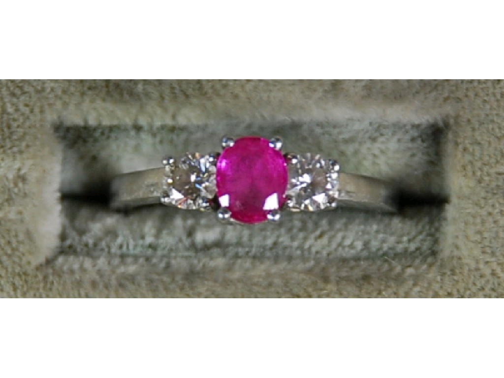 Appraisal: PLATINUM RUBY AND DIAMOND RING set with a centre oval