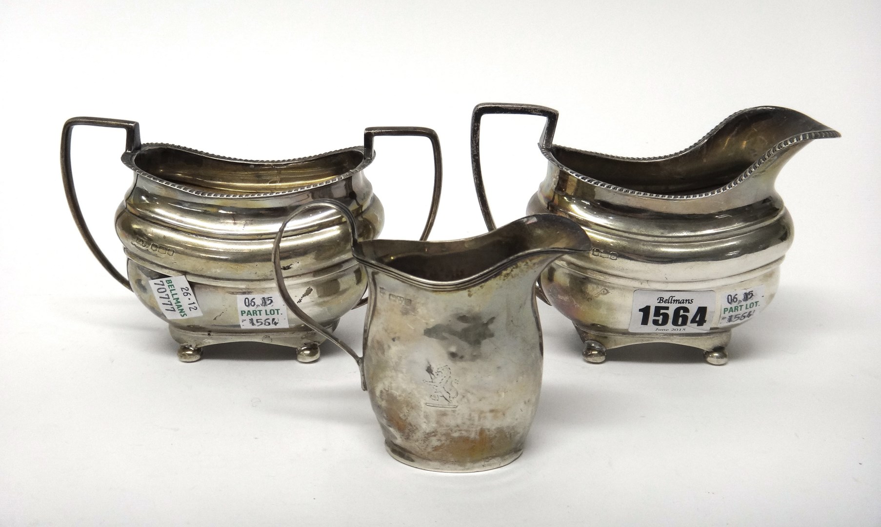 Appraisal: Silver comprising a milk jug and a twin handled sugar