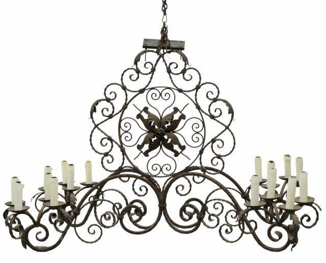 Appraisal: Large wrought iron sixteen-light chandelier late th c foliate scroll