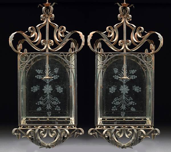 Appraisal: A pair of Renaissance style iron t le and glass