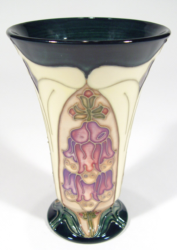 Appraisal: Moorcroft pottery vase of flared form hand painted and tubelined