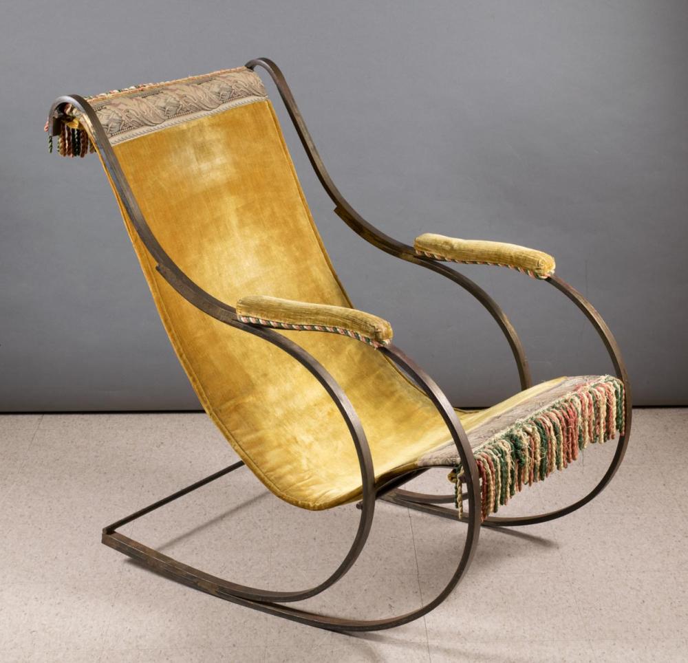 Appraisal: STEEL FRAMED SLING ROCKING CHAIR after a design by Peter