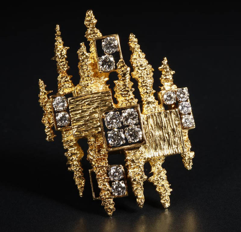 Appraisal: An abstract gold and diamond brooch An abstract gold and