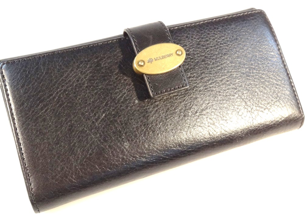 Appraisal: A modern Mulberry purse in black leather with metal clasp