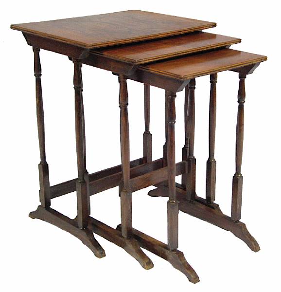 Appraisal: A set of three English walnut nesting tables height in