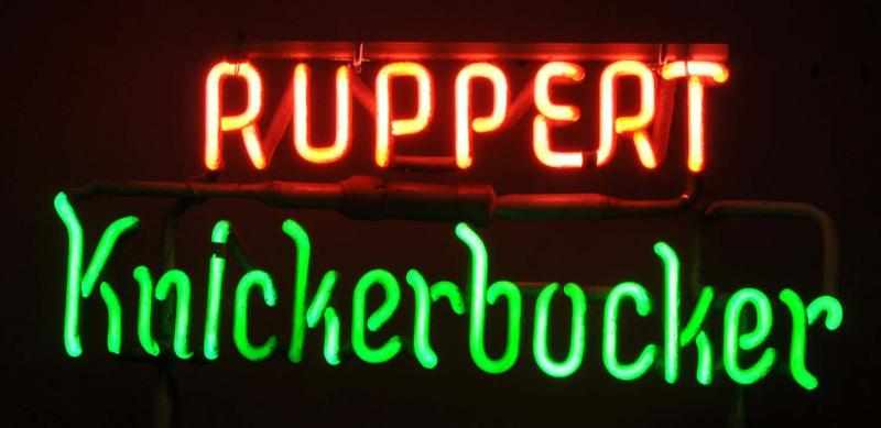 Appraisal: Rupert Knickerbocker Neon Sign Description s Pink and green neon