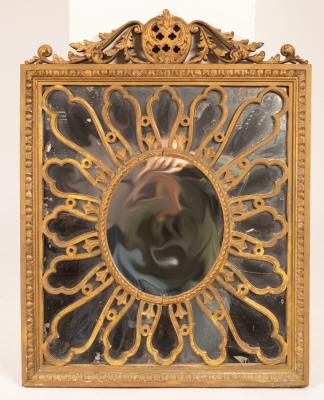 Appraisal: A giltwood wall mirror with scrolling swan neck surmount and