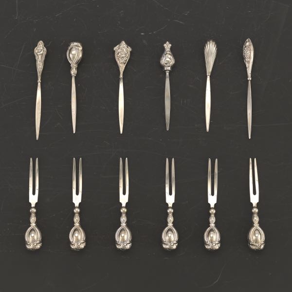 Appraisal: TWELVE STERLING SILVER CANAP FORKS IN PRESENTATION BOX from to