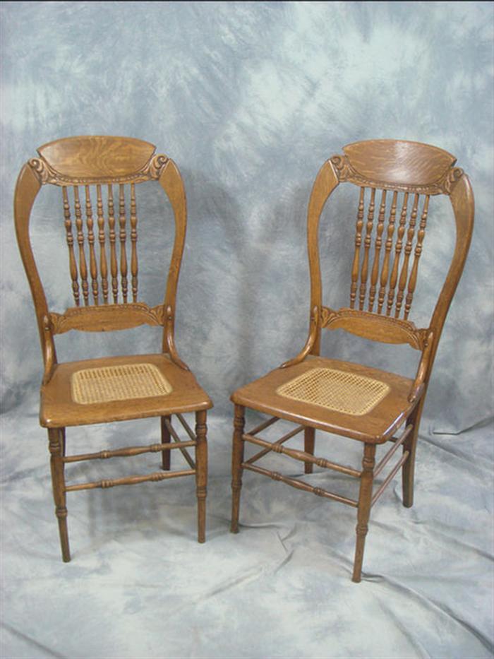 Appraisal: Set spindled balloon back oak caned seat kitchen chairs h