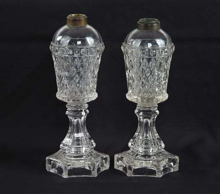 Appraisal: PAIR OF CLEAR SANDWICH TYPE WHALE OIL LAMPS Flint glass