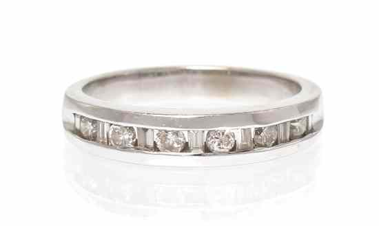 Appraisal: A Karat White Gold and Diamond Band containing six round