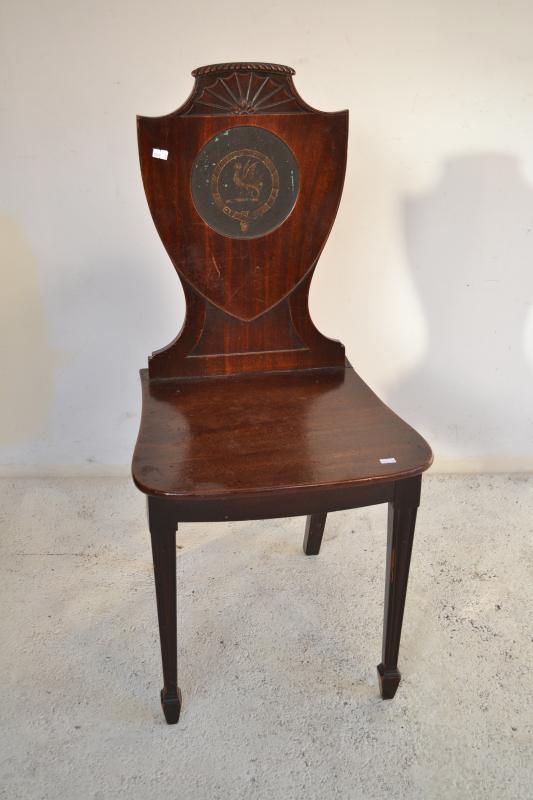 Appraisal: AN EARLY TH CENTURY MAHOGANY HALL CHAIR WITH HERALDIC EMBLEM