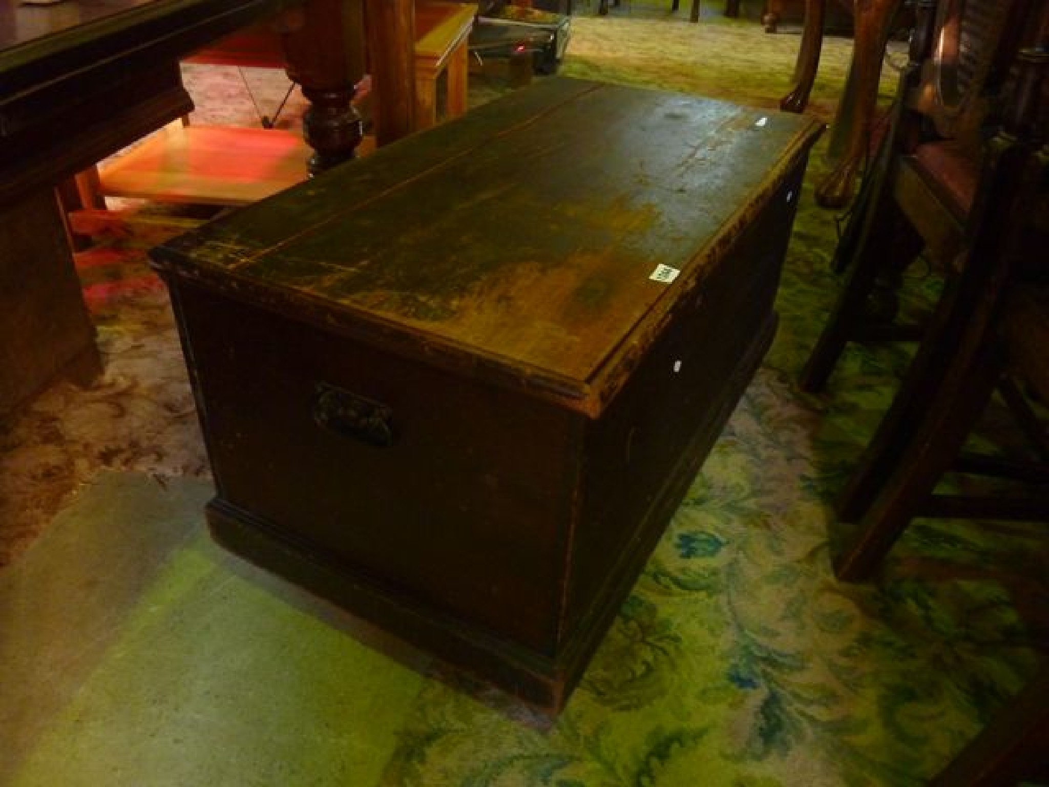 Appraisal: A Victorian stained pine box with hinged lid and iron