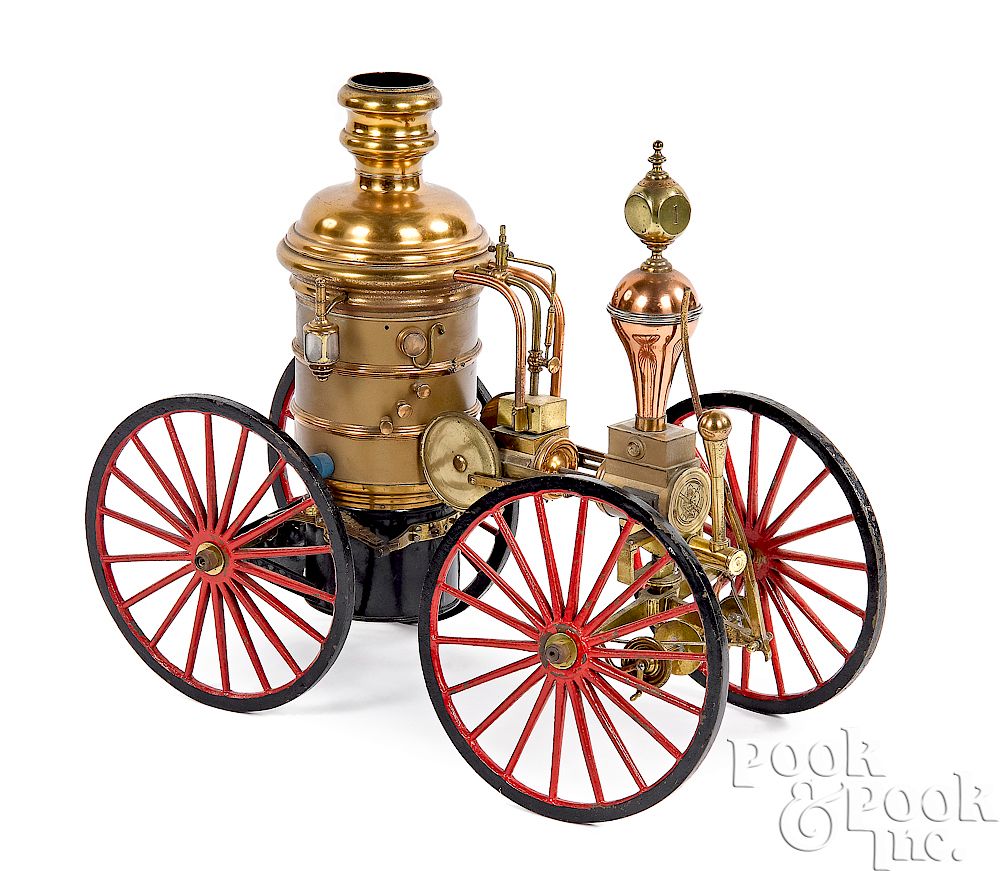 Appraisal: Brass and copper fire pumper model Brass and copper fire