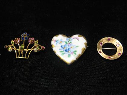 Appraisal: Three enamel and gem set White enamel heart with painted