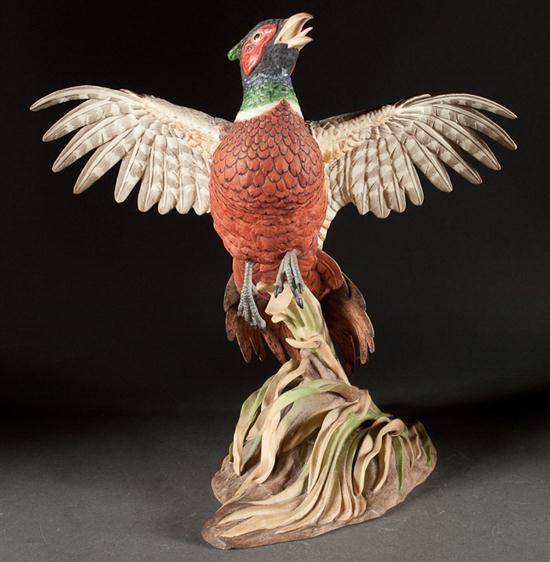 Appraisal: Boehm painted bisque porcelain figure of a pheasant in flight