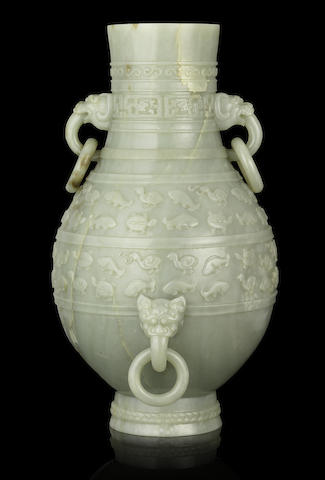 Appraisal: A magnificent Imperial pale green jade archaistic vase hu Qianlong