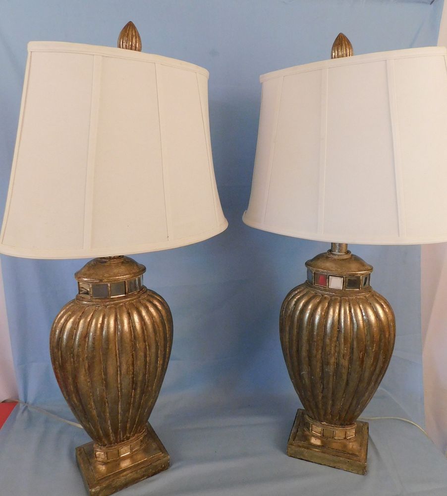 Appraisal: PAIR MID CENTURY LAMPS Pair of heavy vintage grooved mirrored