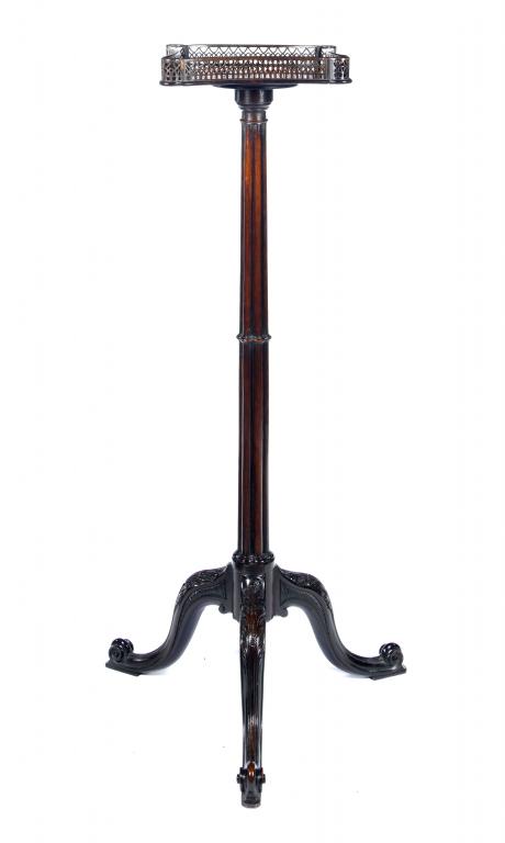 Appraisal: A GEORGE III MAHOGANY TORCHERE the concave sided top with