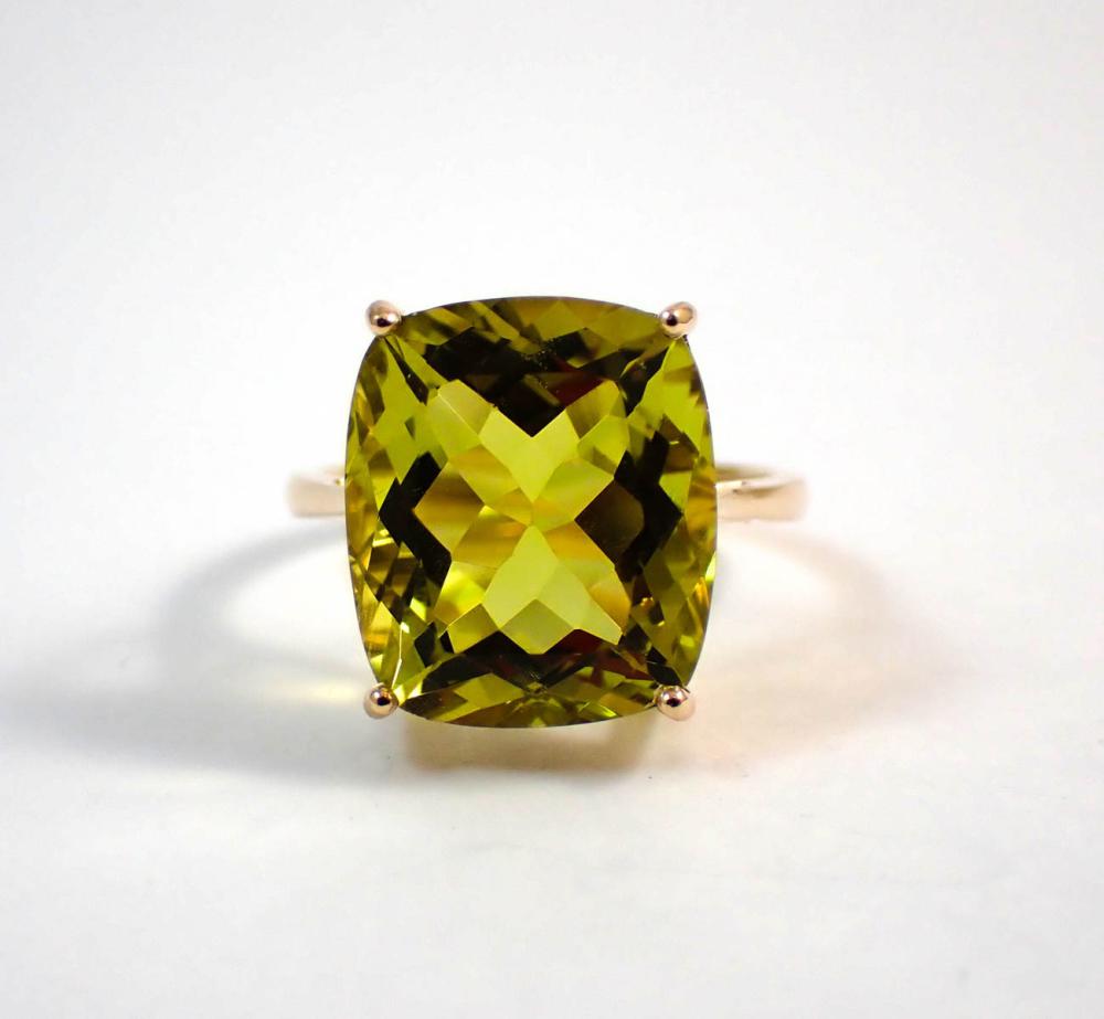 Appraisal: LEMON QUARTZ AND FOURTEEN KARAT GOLD RING with four yellow