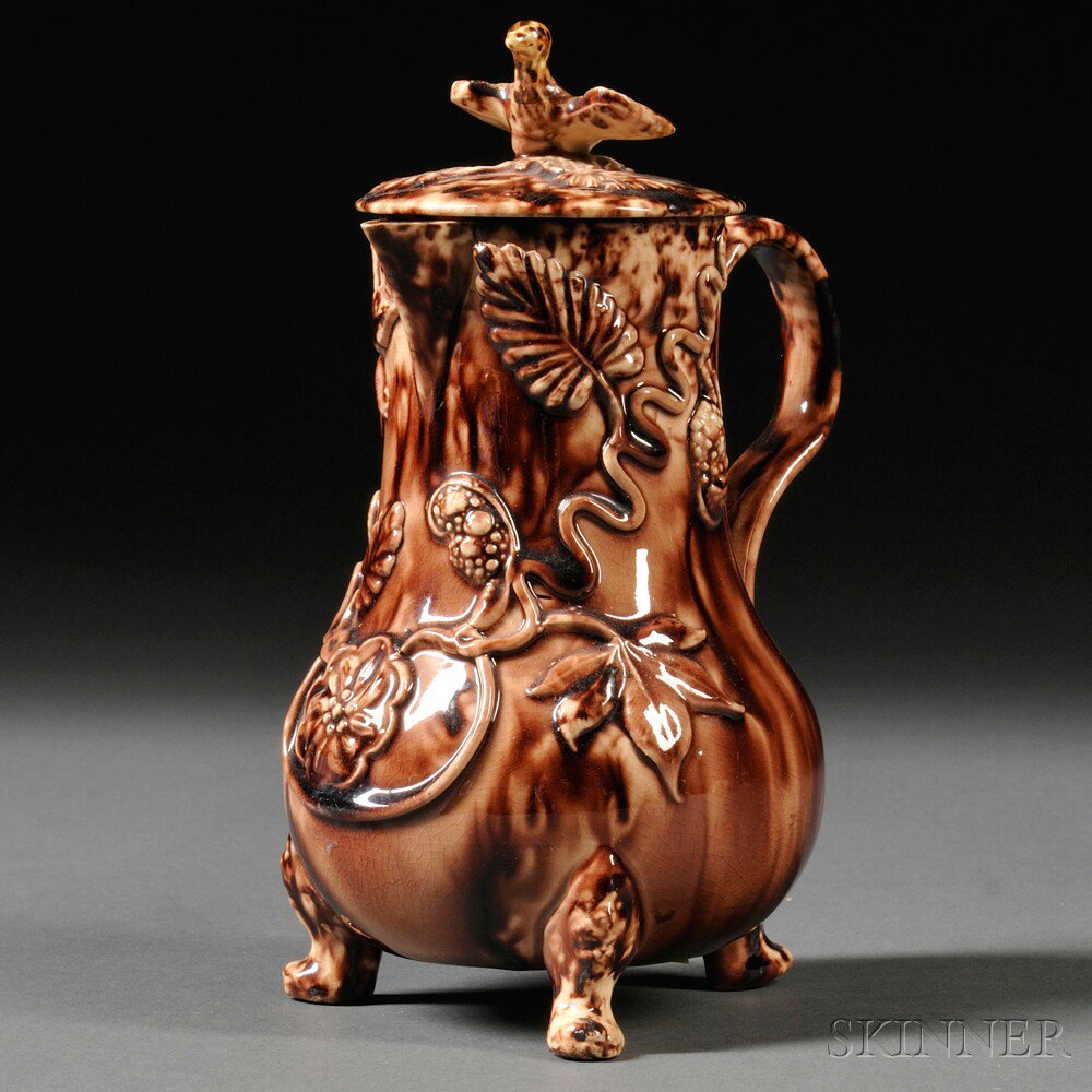 Appraisal: Staffordshire Cream-colored Earthenware Creamer and Cover England c manganese decorated