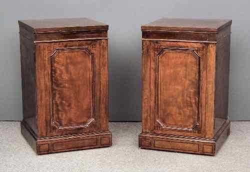 Appraisal: A pair of mahogany pedestal cupboards of Georgian design inlaid