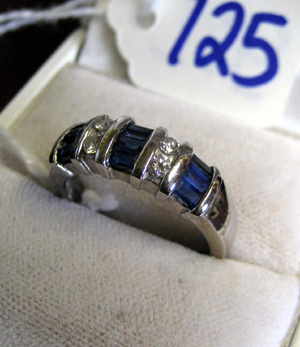 Appraisal: DIAMOND BLUE SAPPHIRE AND FOURTEEN KARAT WHITE GOLD RING The