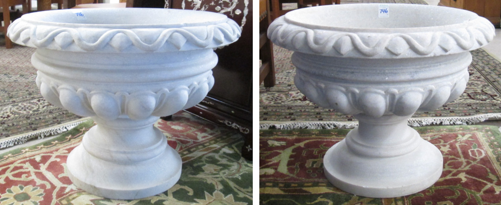 Appraisal: A PAIR OF CARVED CARARRA MARBLE PLANTERS each a round