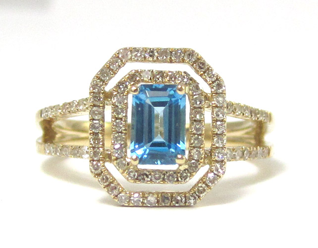 Appraisal: BLUE TOPAZ DIAMOND AND FOURTEEN KARAT GOLD RING with round-cut