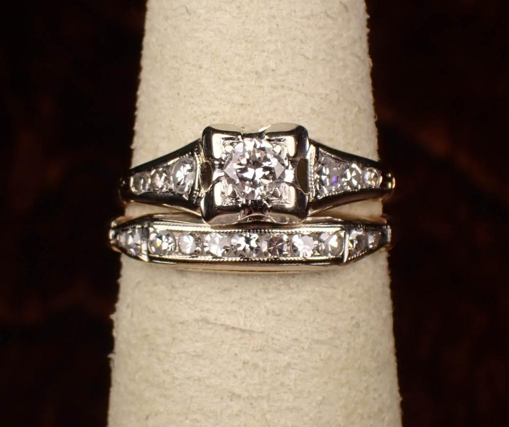 Appraisal: DIAMOND AND FOURTEEN KARAT GOLD WEDDING SET including a k