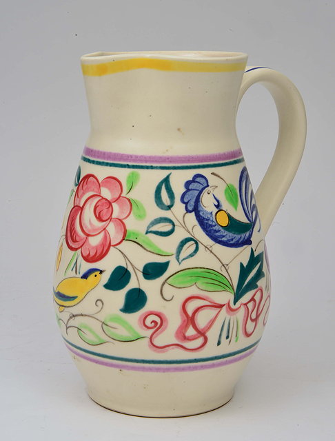 Appraisal: A POOLE POTTERY JUG with bird and flower decoration cm