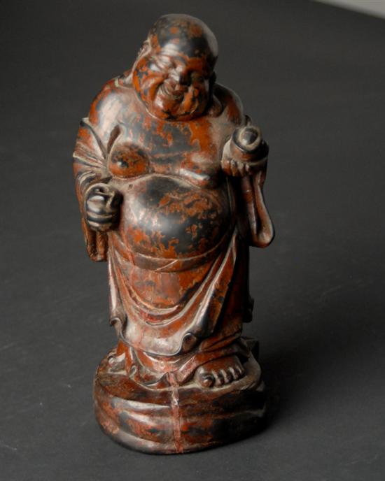 Appraisal: A Carved Wood and Polychromed Buddha probably th C smiling