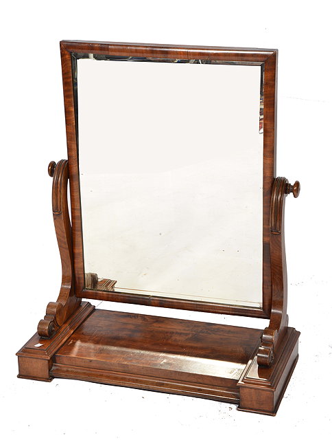 Appraisal: A VICTORIAN MAHOGANY RECTANGULAR DRESSING TABLE MIRROR with scroll supports