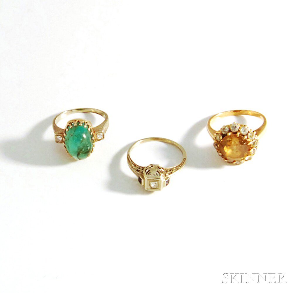 Appraisal: Three Gold Rings a kt yellow gold ring with central