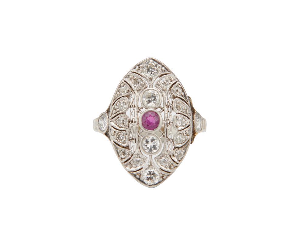 Appraisal: Platinum Diamond and Ruby Ring the open-work navette-form ring centering