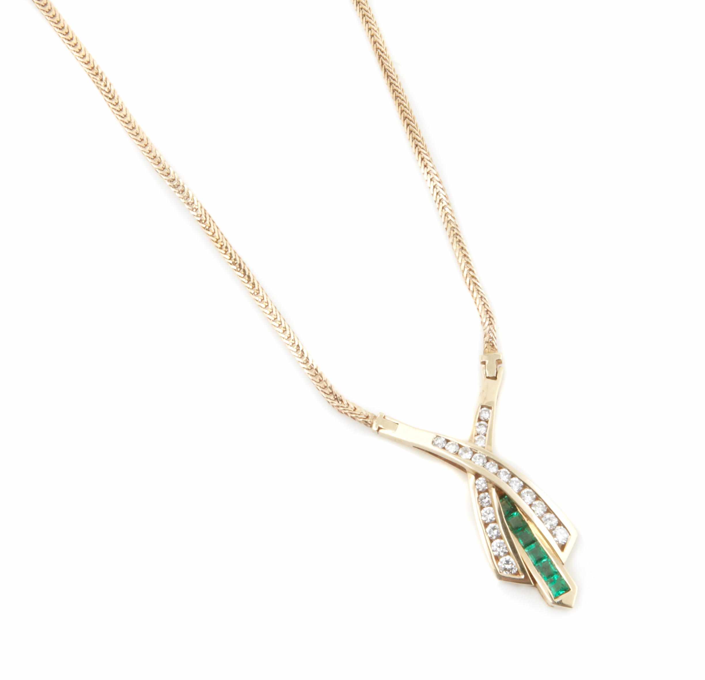 Appraisal: A diamond emerald and k gold necklace length in