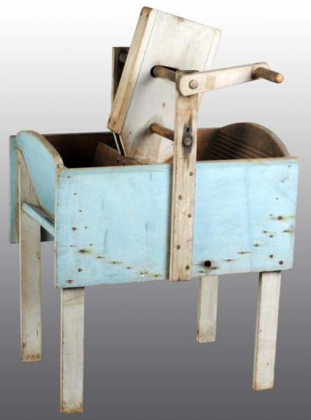 Appraisal: Wooden Blue Washing Machine Description Early turn of the century