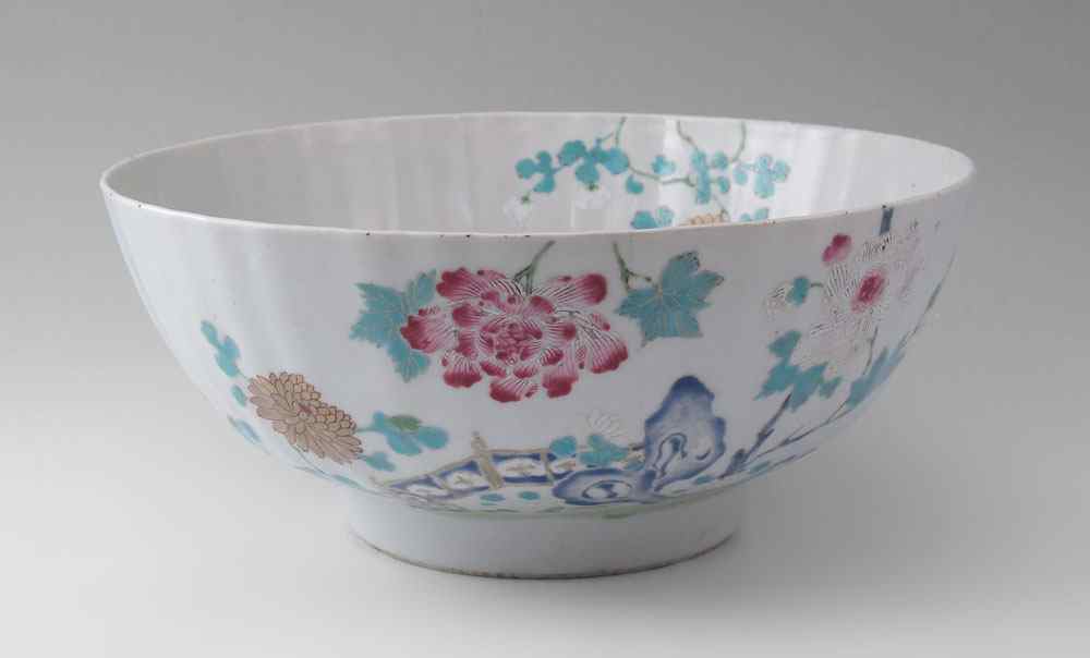 Appraisal: CHINESE EXPORT FLORAL DECORATED DEEP BOWL Slightly ribbed bowl decorated