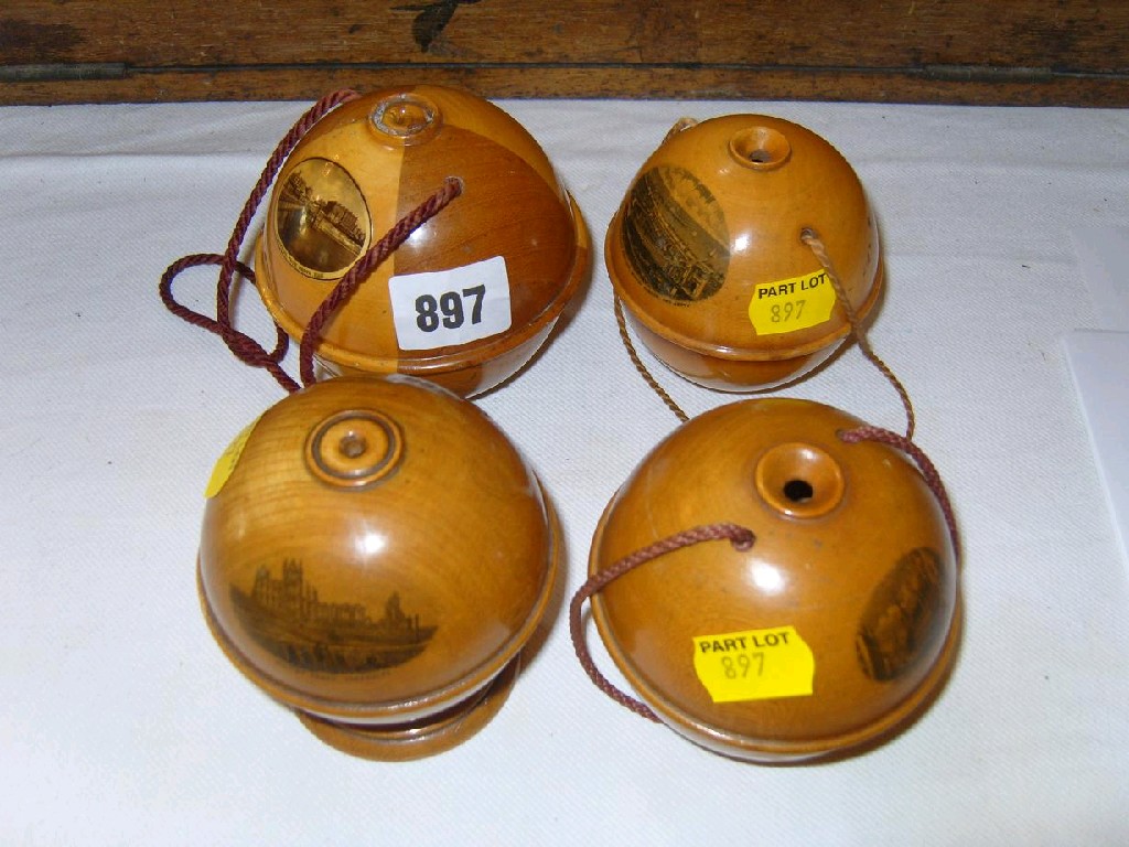 Appraisal: A collection of four Mauchline ware wool balls hanging comprising