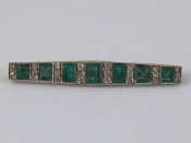 Appraisal: An carat gold and platinum emerald and diamond brooch the