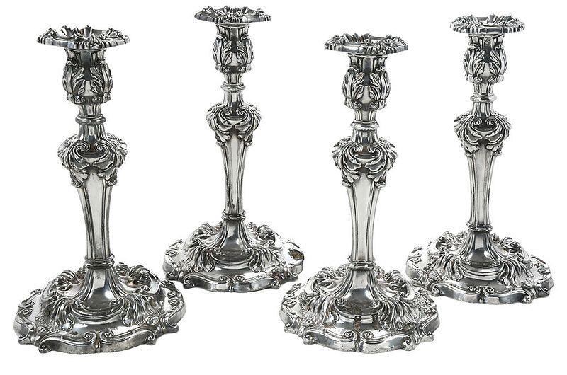 Appraisal: Set of Four Silver Plate Candlesticks American th century scroll