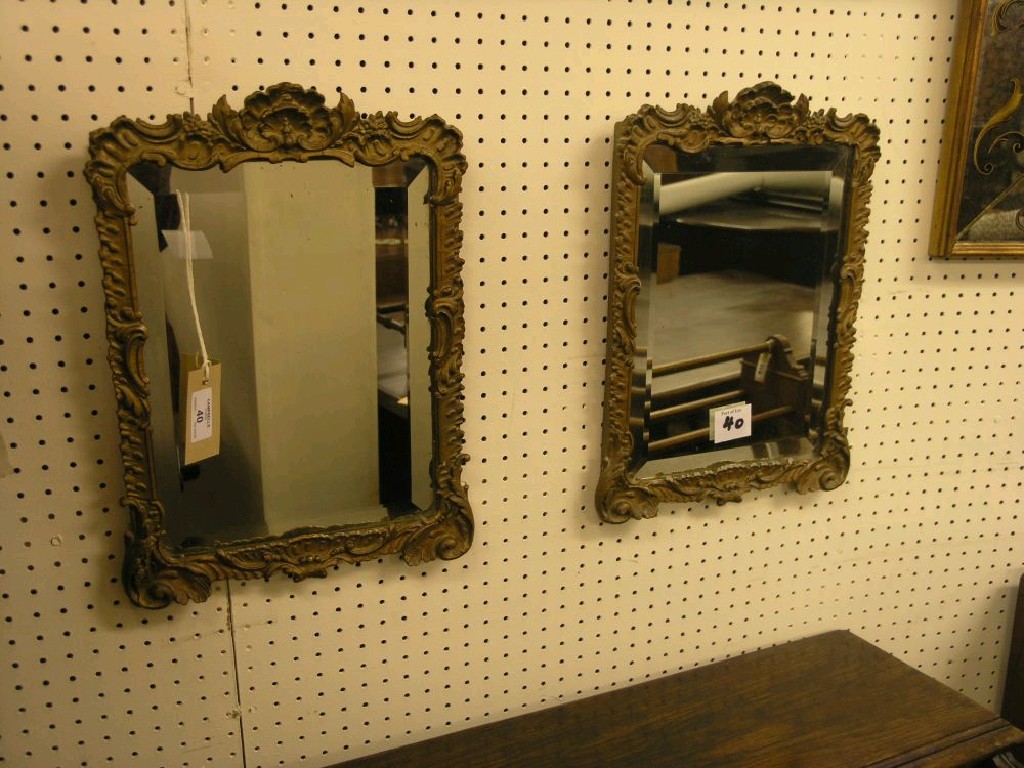 Appraisal: A pair of wall mirrors rectangular shape with bevelled plates