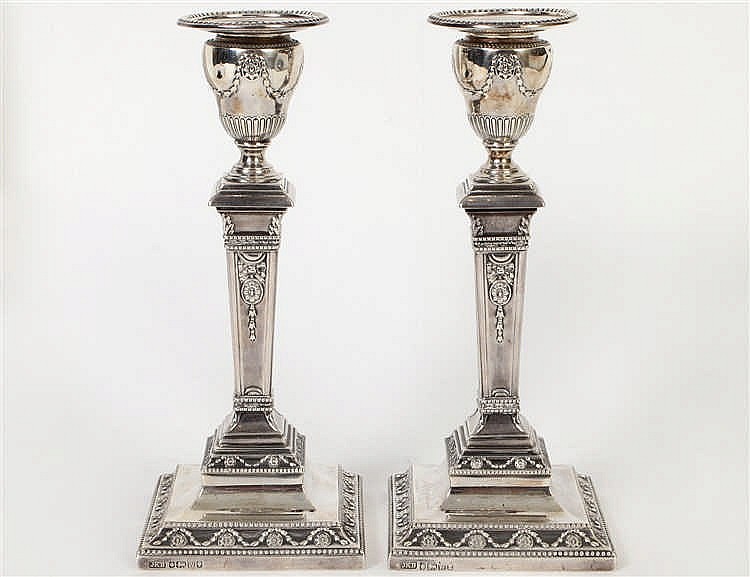 Appraisal: PAIR OF VICTORIAN SILVER CANDLESTICKS th Century Hallmarked with maker