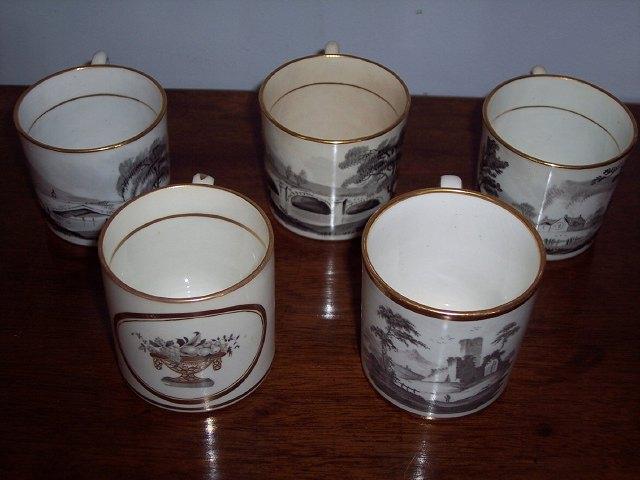 Appraisal: Three Spode early th Century coffee cans bat printed river