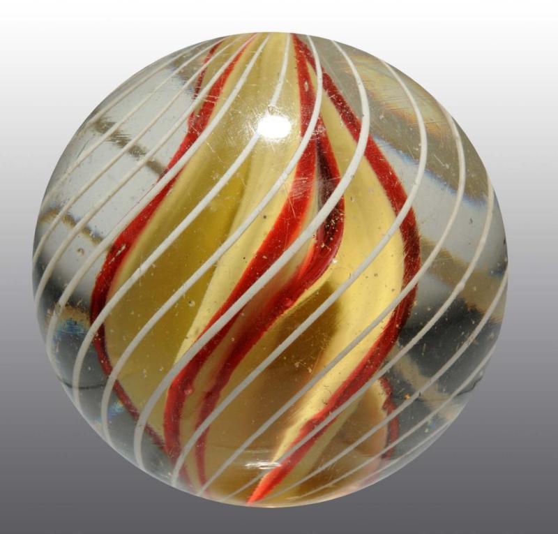 Appraisal: Lobed-Core Swirl Marble Description Core is yellow and red with