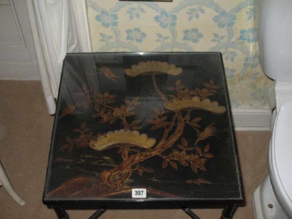 Appraisal: A PAIR OF LACQUER OCCASIONAL TABLES the square tops decorated